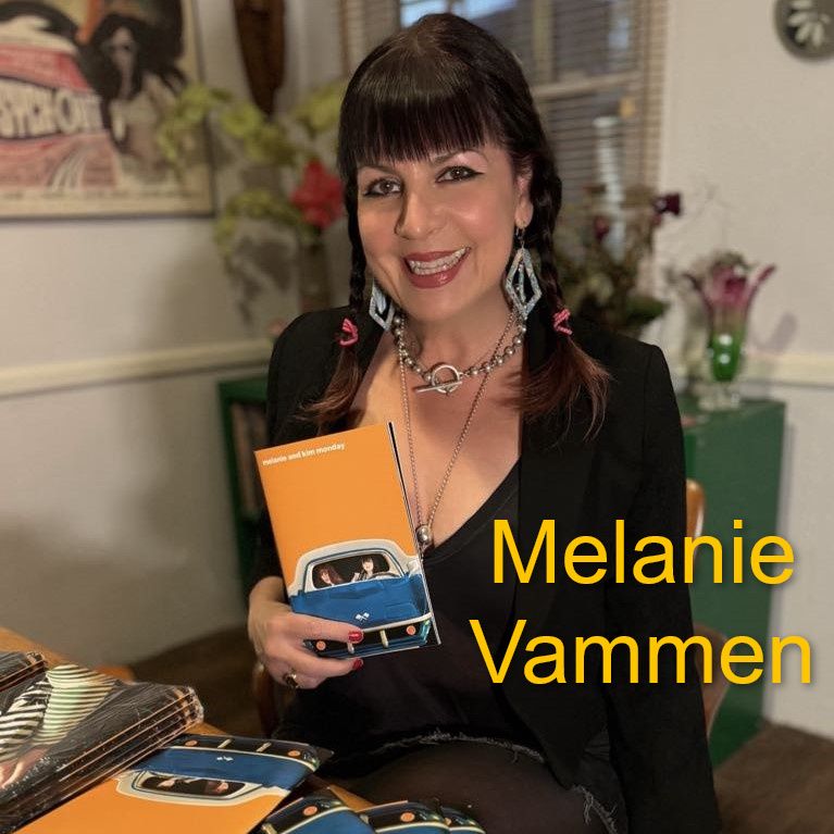 Melanie Vammen holding a copy of "Melanie And Kim Mondays"