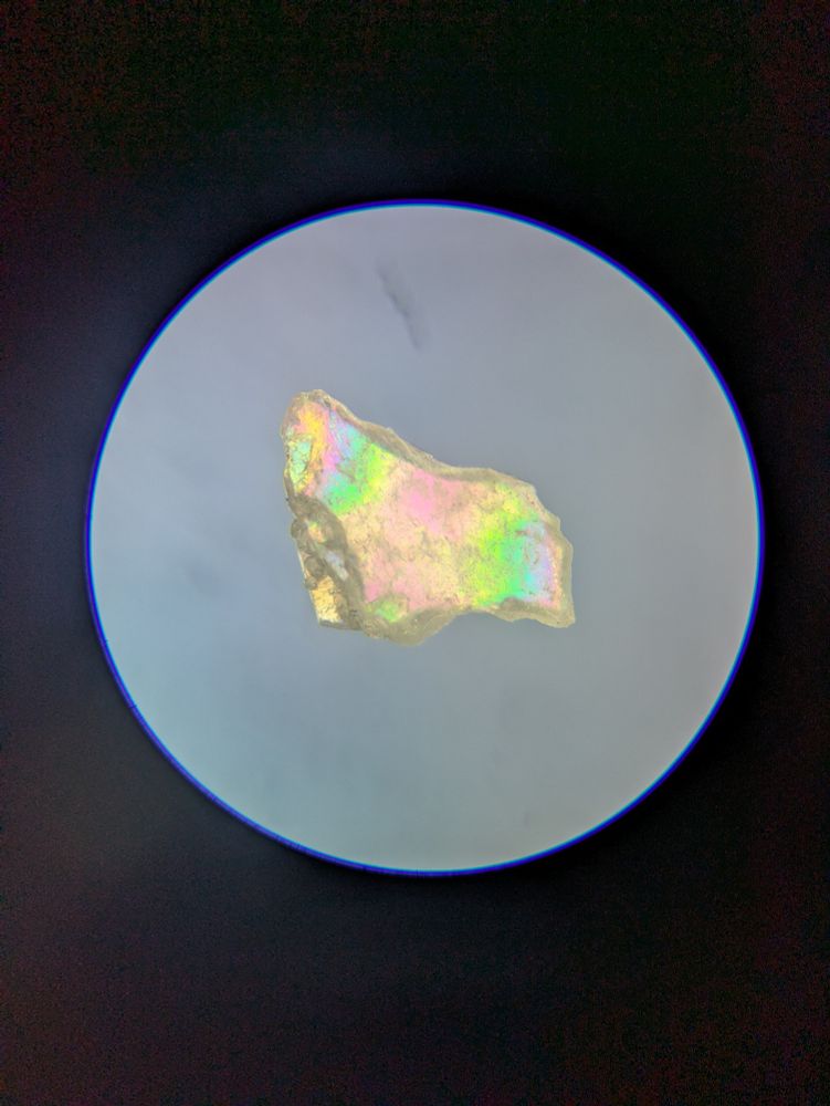 A shimmering rainbow chunk of sand, which could look like a horse or something if you're inclined to see shapes in clouds 