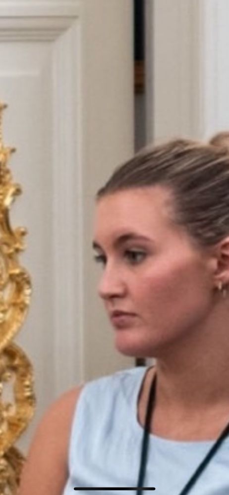 A White House aide staring blankly into the distance 