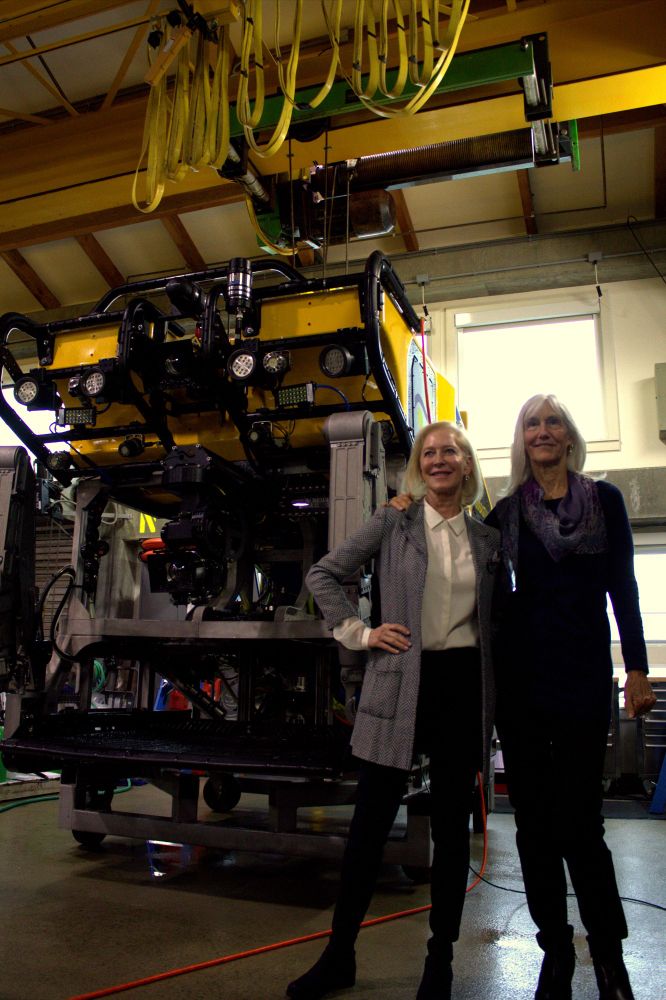 Wendy Schmidt and Julie Packard stand in front of ROV Subastian.