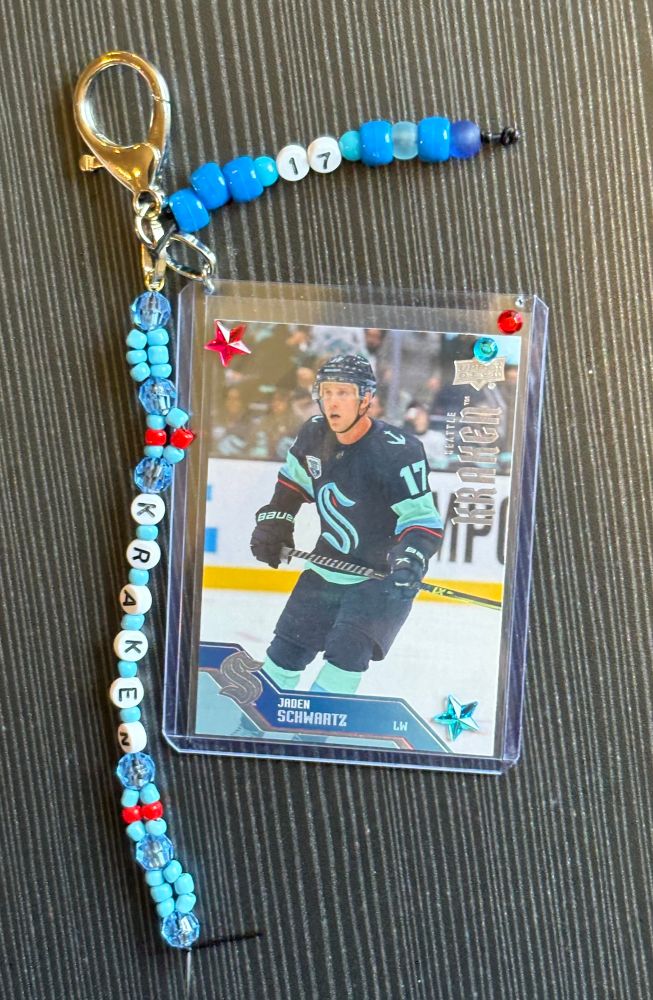 Jaden schwartz hockey card on a keychain