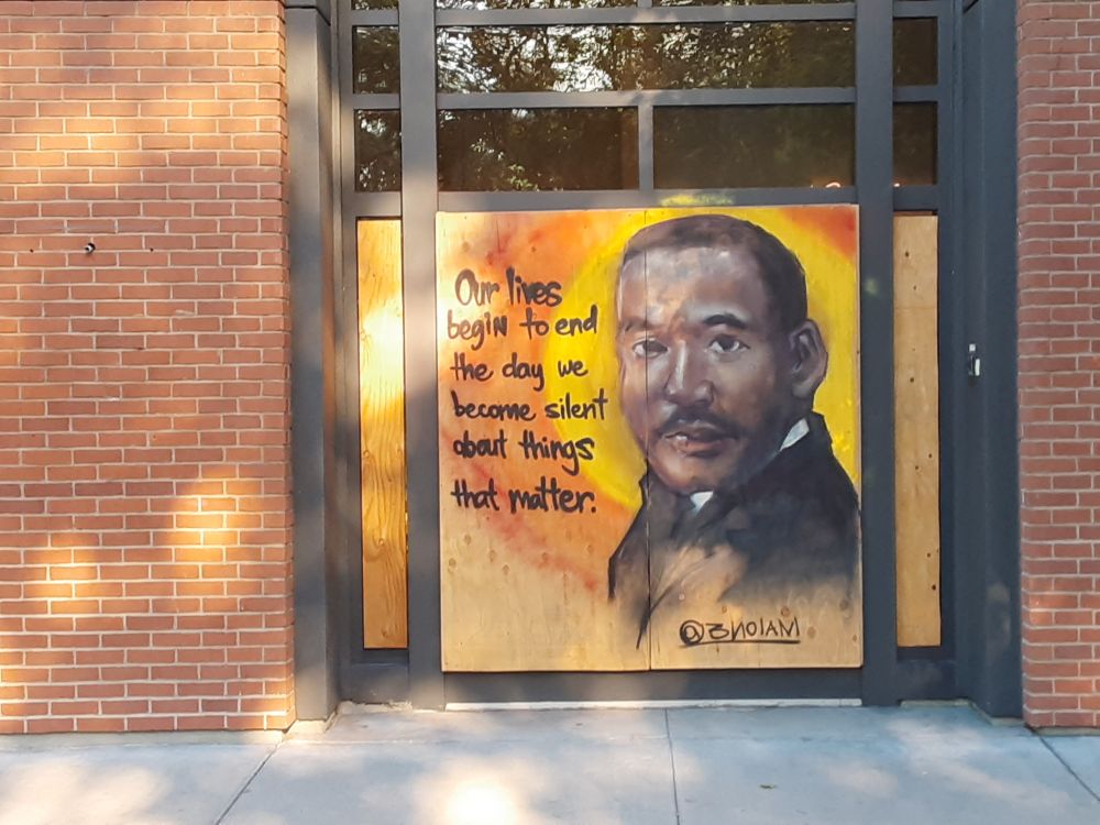 Mural

A mural of Martin Luther King Jr. beside his quote "Our lives begin to end the day we become silent about things that matter."