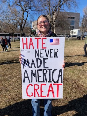 Protester with sign at the 2/17/25 #50501 event at the US Capitol.