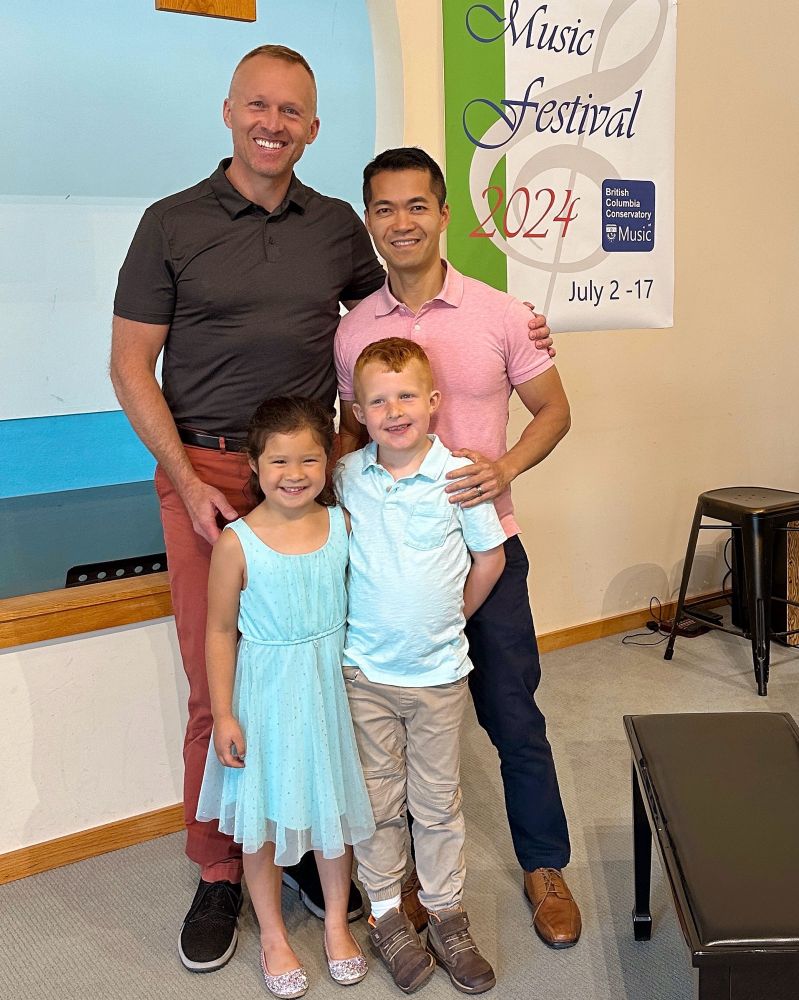 Happy, interracial husbands and gay dads with two kids. 