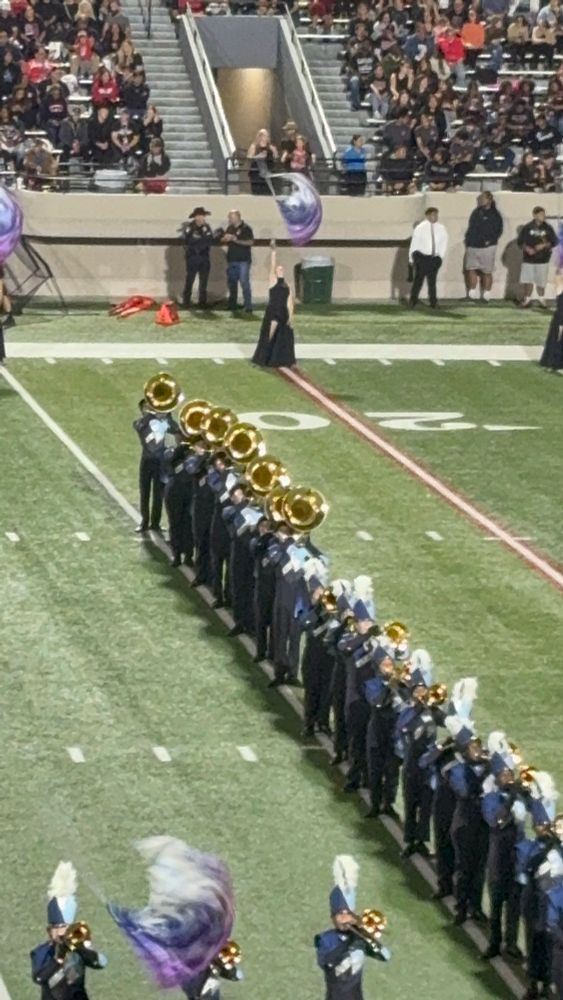 Band and color guard on field 