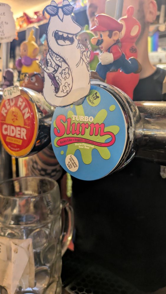 A beer tap. It has Slurm written on it, which is a drink from Futurama.