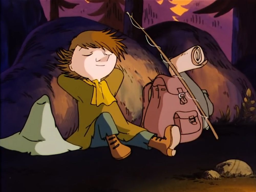 Snufkin getting comfy, sitting against a big rock, with his arms behind his head and eyes closed. 
