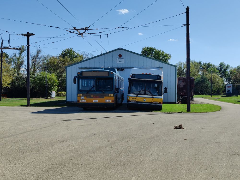 KCM Metro Gillig Phantom and MBTA Neoplan AN440 outside of the IRM trolleybus barn 