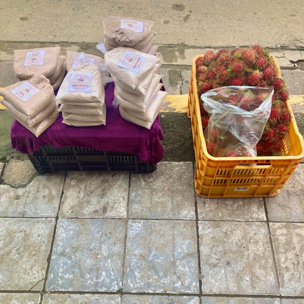 Street lichas and some local ground nut meals on a Tela sidewalk. North coast of Honduras.