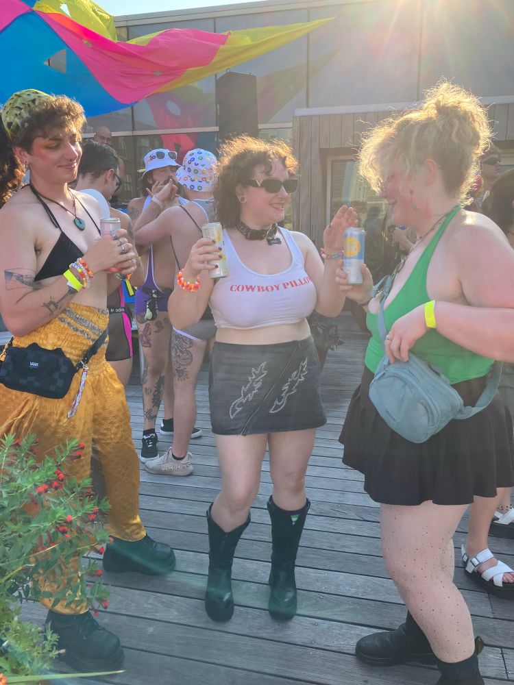 Emit, Jordan and Madi dancing outside 