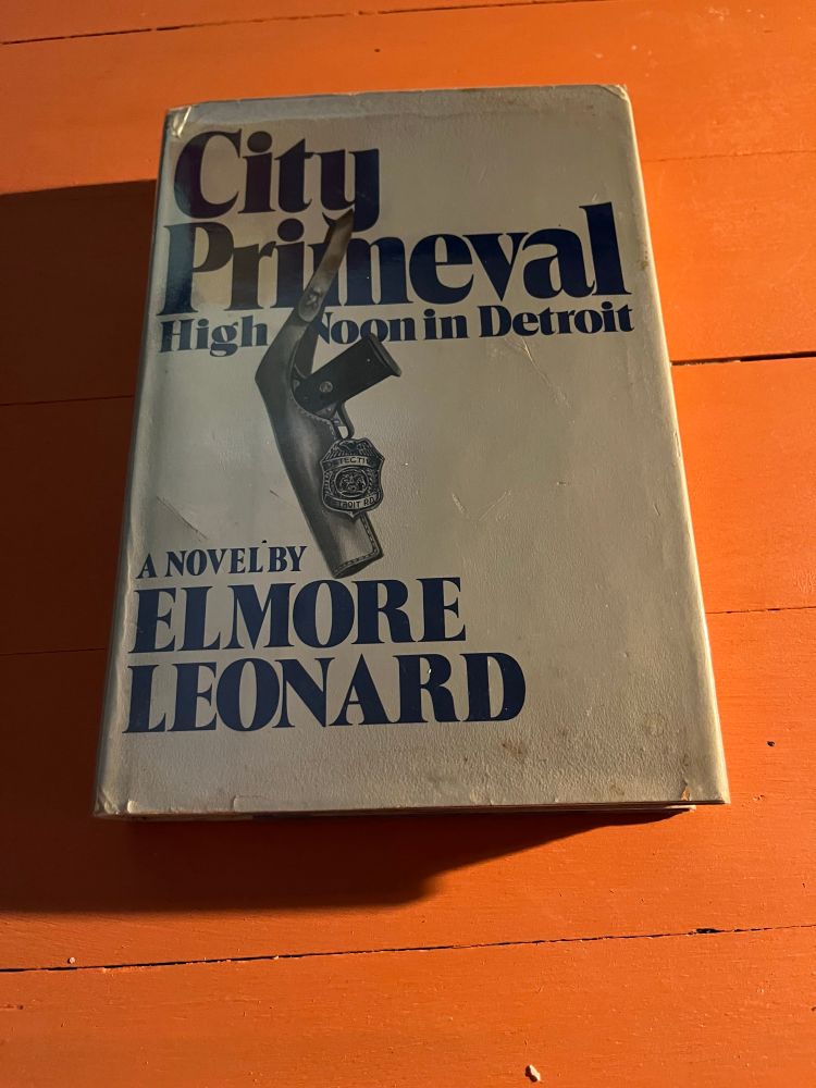 Hardcover US 1st of ‘City Primeval :High Noon In Detroit’ by Elmore Leonard. Featuring an illustration of a semi auto pistol in a cut away shoulder holster rig
