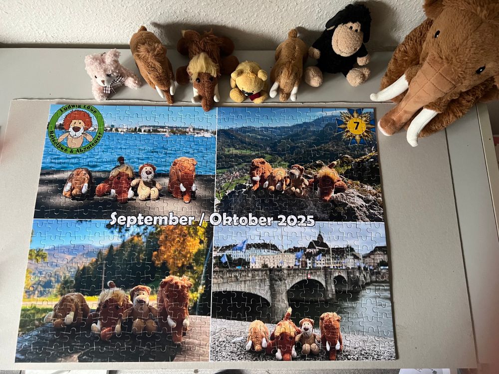 Die drei plüschigen Mammuts, Kuschelmammut, Hase, Schaf und Bär mit dem fertigen Puzzle