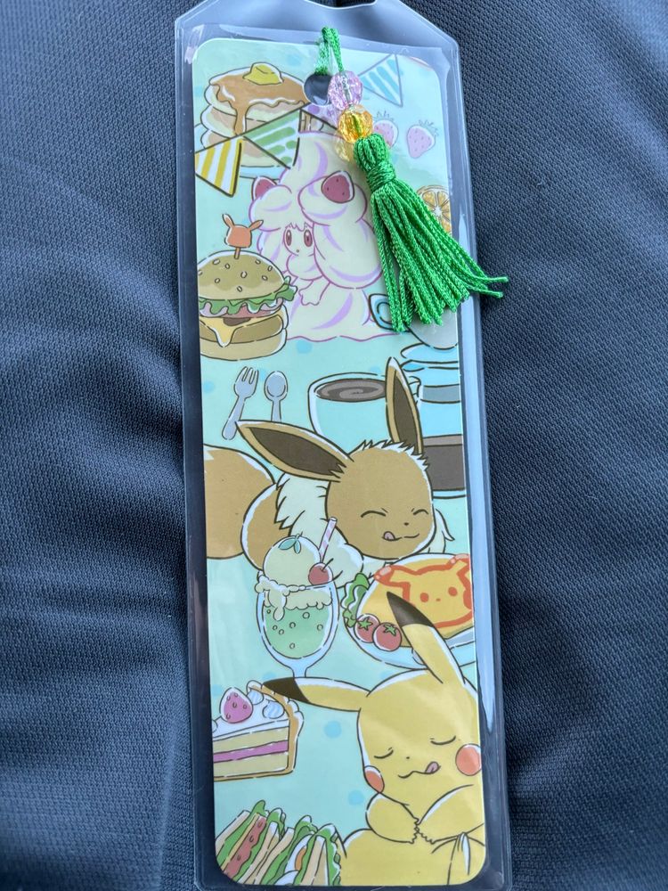 a bookmark with pikachu, eevee, and alcremie