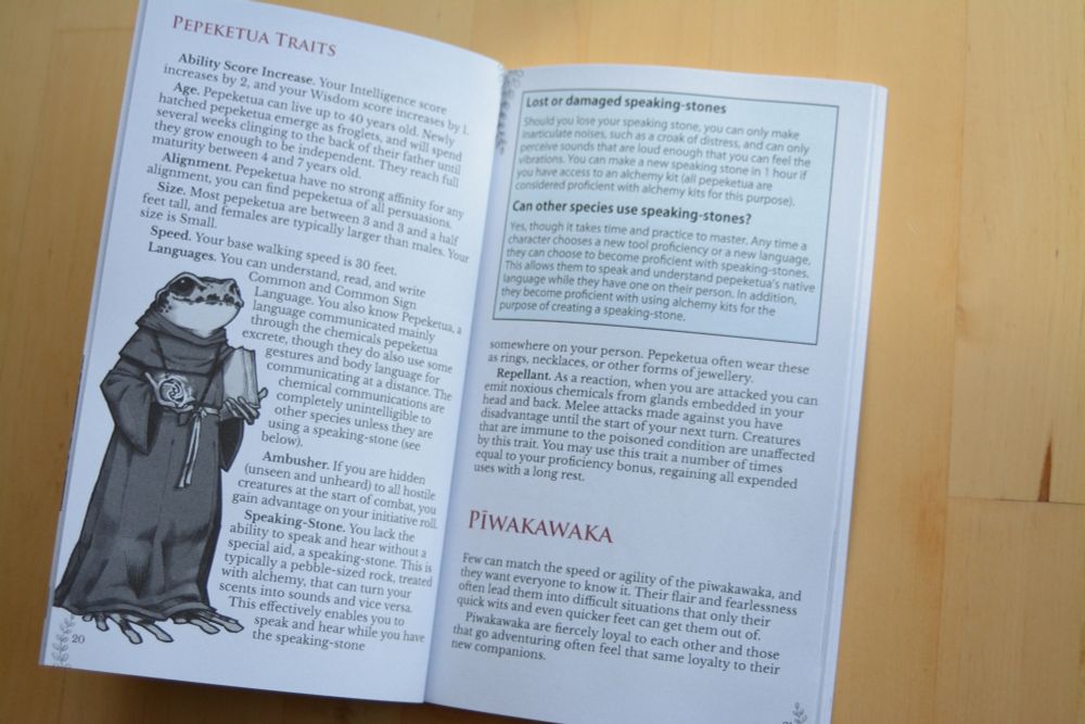 Spread from LotLWC, featuring an anthropomorphised pepeketua (archey's frog) in a monk's habit.