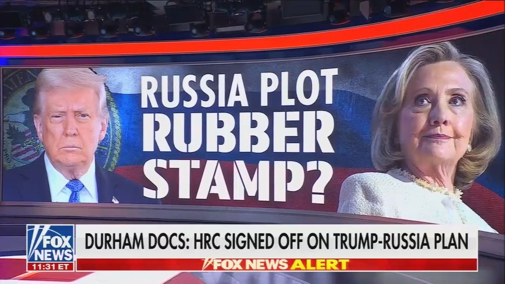 Fox News graphic "Russia plot rubber stamp?" with a picture of Hillary Clinton and Donald Trump 

Chyron reads: Durham docs: HRC Csigned off on Trump-Russia Plan 

(None of this is true, hence the ?) 