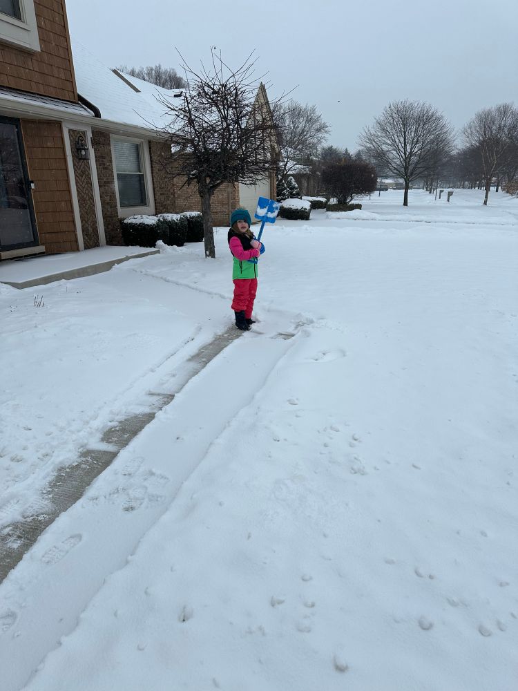 My daughter shoveling 