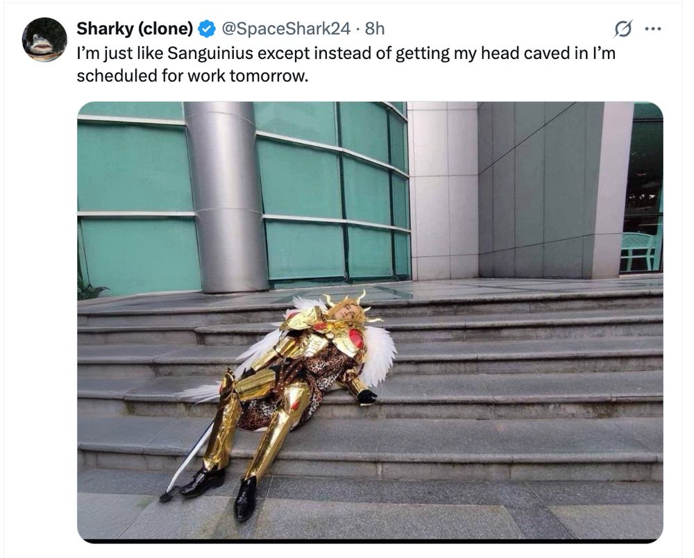 Blood Angels Primarch Sanguinius dead on the steps of his 9-5 job...