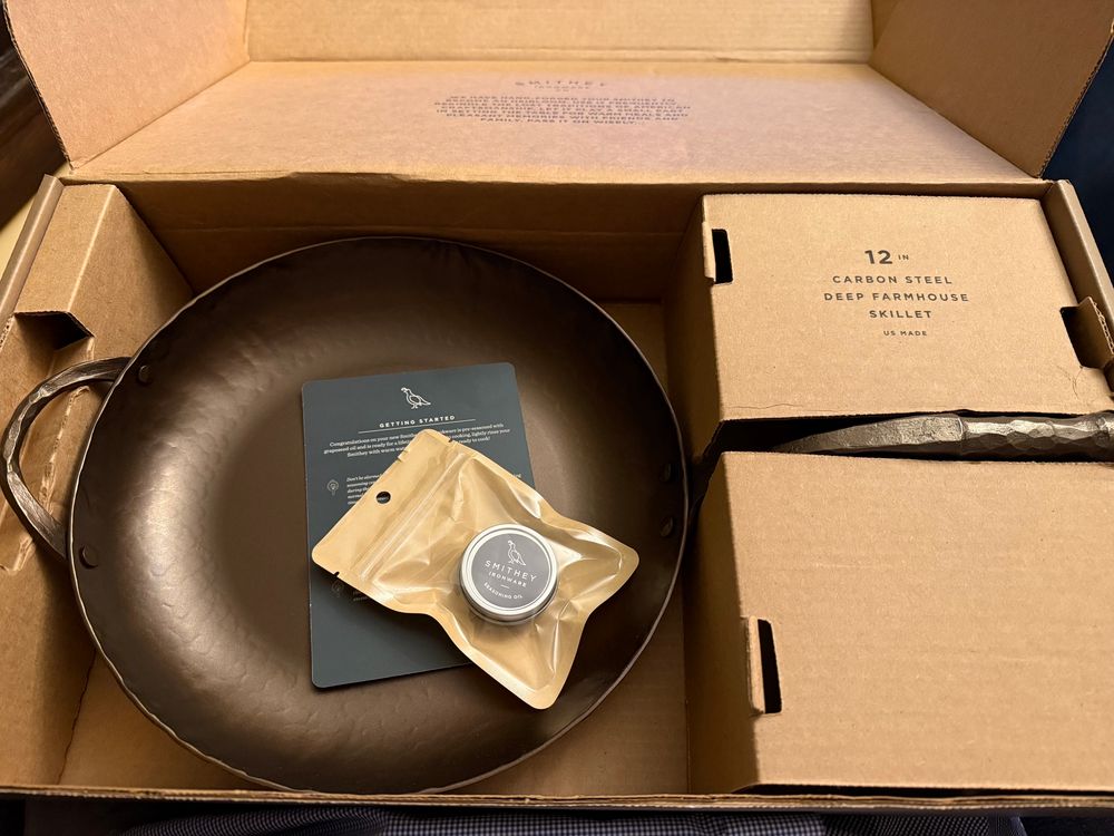 12” carbon steel pan in a box.