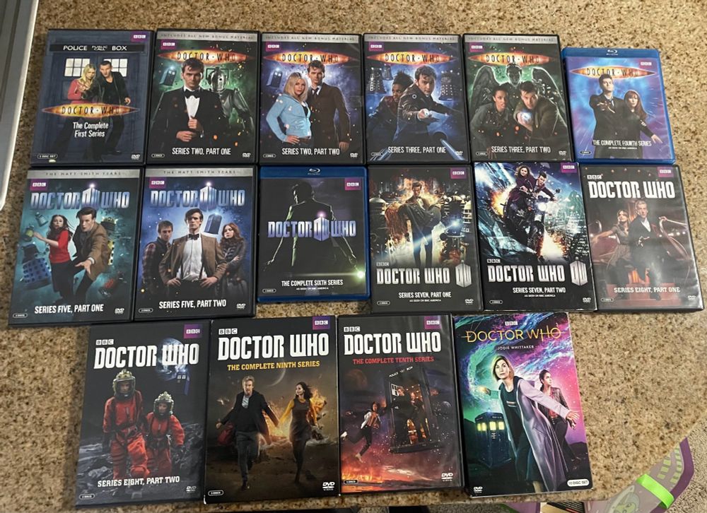 Image shows 12 DVDs from the British television show known as Doctor Who.