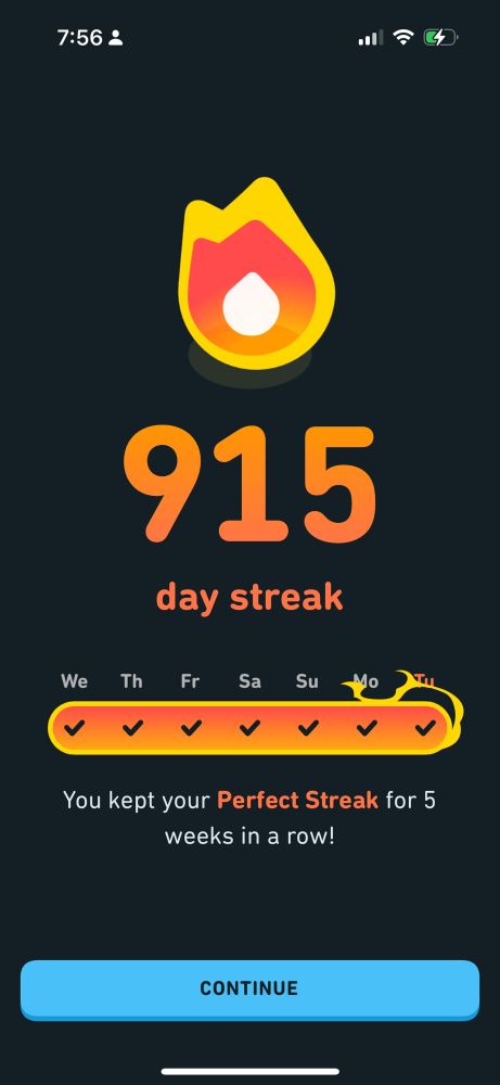 A screenshot from the Duolingo app showing I’ve completed a week of lessons and a 915 day streak 