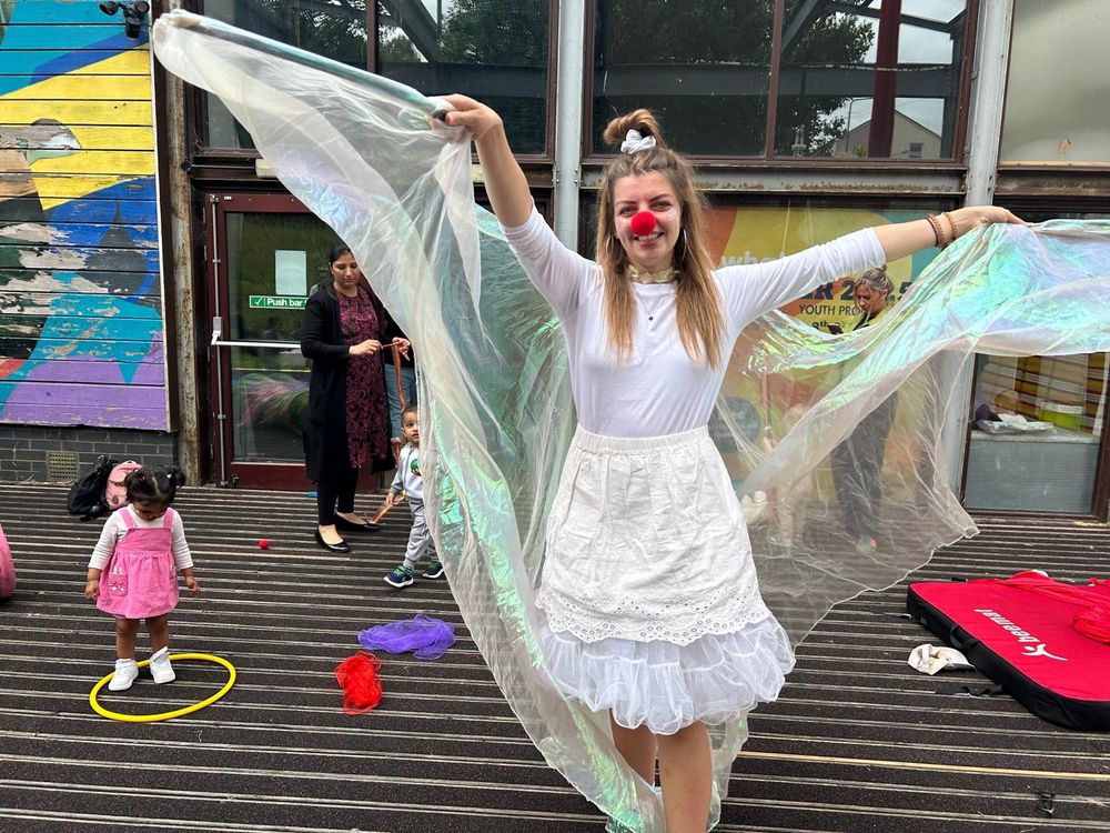 Expecting Something assistant Angie dressed up as an angel with a red nose