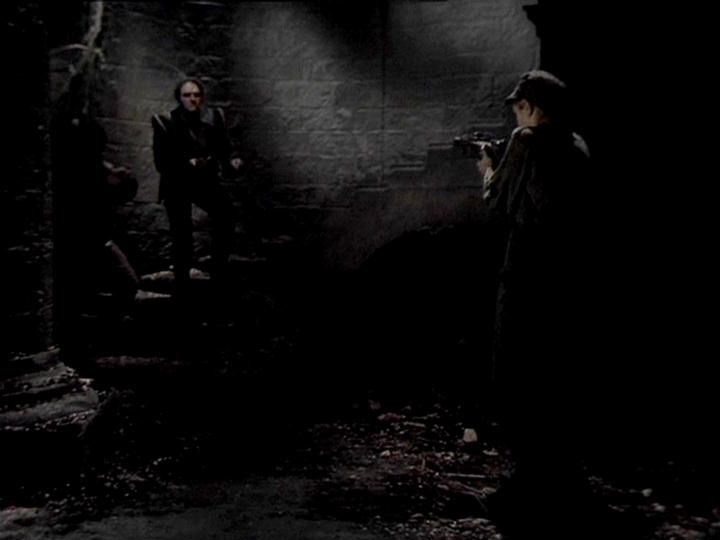 

Claude Sonnet 4.0 describes the image as: "I can see this is a dark, atmospheric scene set in what appears to be an underground or dungeon-like environment with stone walls. The lighting is dim and moody, creating shadows throughout the space. There are figures visible in the scene - some standing and positioned in different areas of this stone chamber or corridor. The setting has a gritty, oppressive feel typical of a prison or underground facility. The stone architecture and low lighting contribute to a sense of confinement or danger. Without being able to clearly identify specific individuals in this particular shot, I can observe that the scene appears to involve multiple characters in what seems to be a tense or dramatic situation within this stark, institutional-looking stone environment."

Blakes7Bot, version 3.9.31. AWS Lambda version: 1.14.