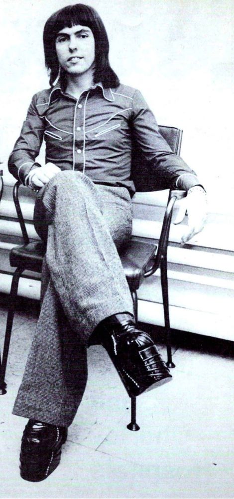 Dave Hill of Slade looking reasonably normal, but is wearing Herman Munster's boots.