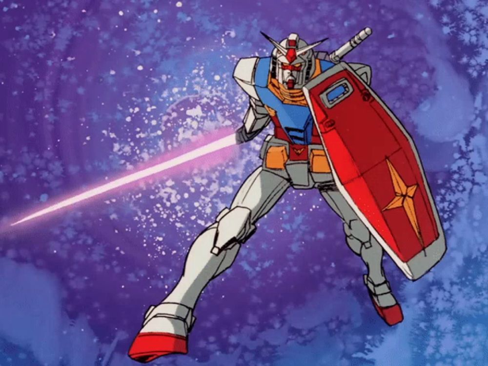 a robot with a red and white shield is holding a light saber