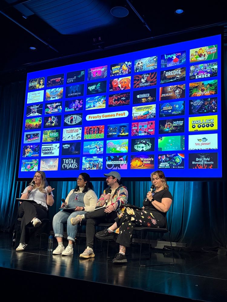 Amy, Pritika, Kieron and Lucy on stage showing the 50+ games featured in Frosty Games Fest. 