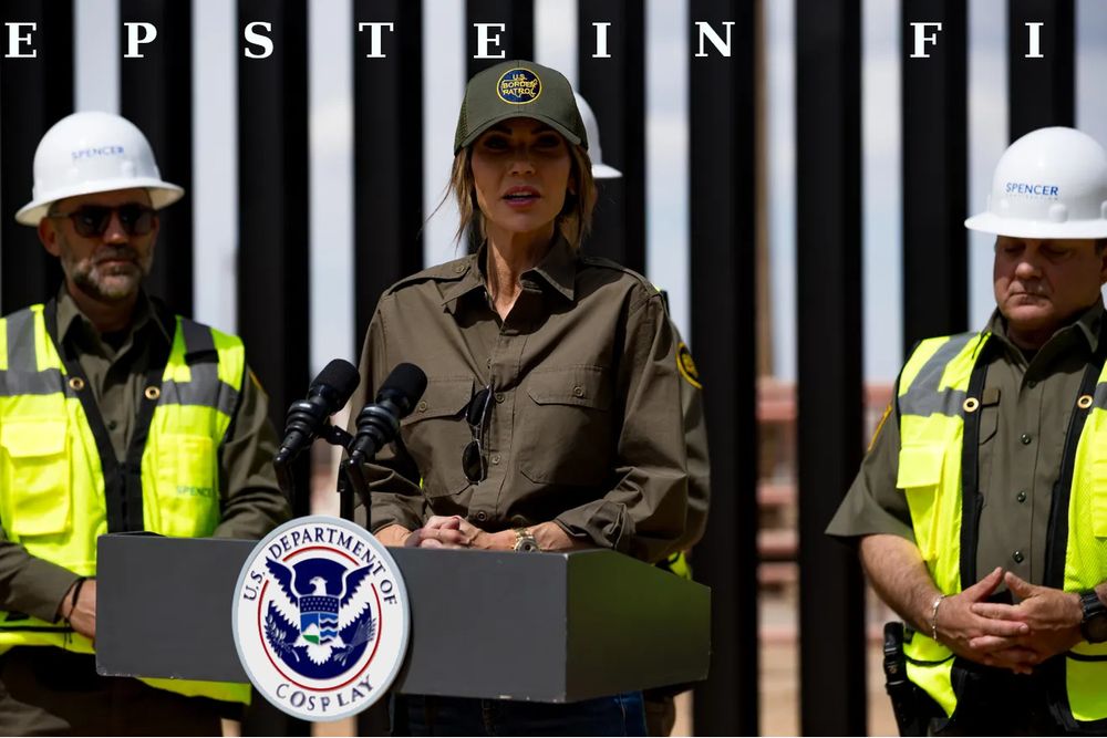 Cosplay Barbie in front of the border wall at a lectern with a seal having the text 'U.S. Department of Homeland Security'. The words 'Homeland Security' are replaced by 'Cosplay'.