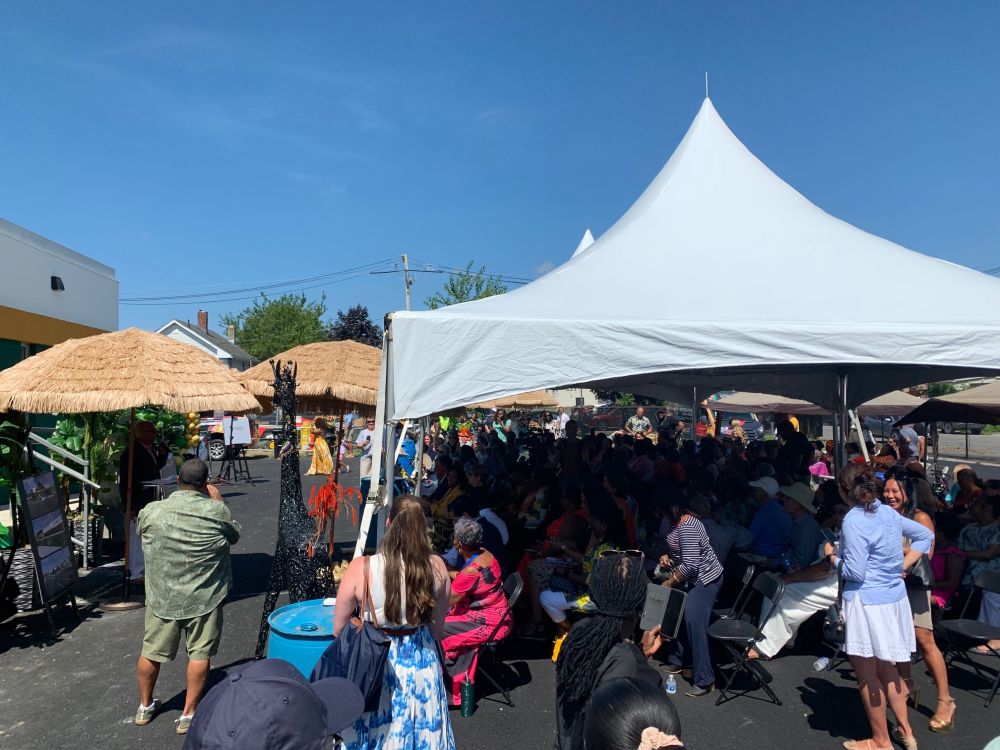 Ribbon cutting crowd at Higher Ground International.