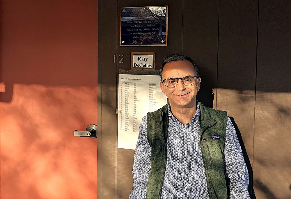 Patricio Fernandez, 2022-23 CASBS fellow, in front of CASBS study #12