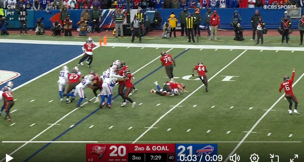 Baker celebrating the TD while the runner is still 5 yards behind the line of scrimmage. 