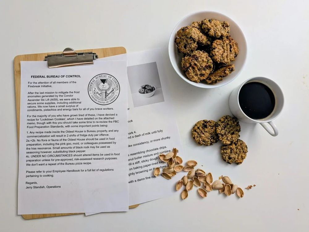 Remedy community fan work of the month of June 2025. On the left side there is a clipboard with an FBC document. On the right there is a bowl of cookies, a cup of coffee and pistachio shells.