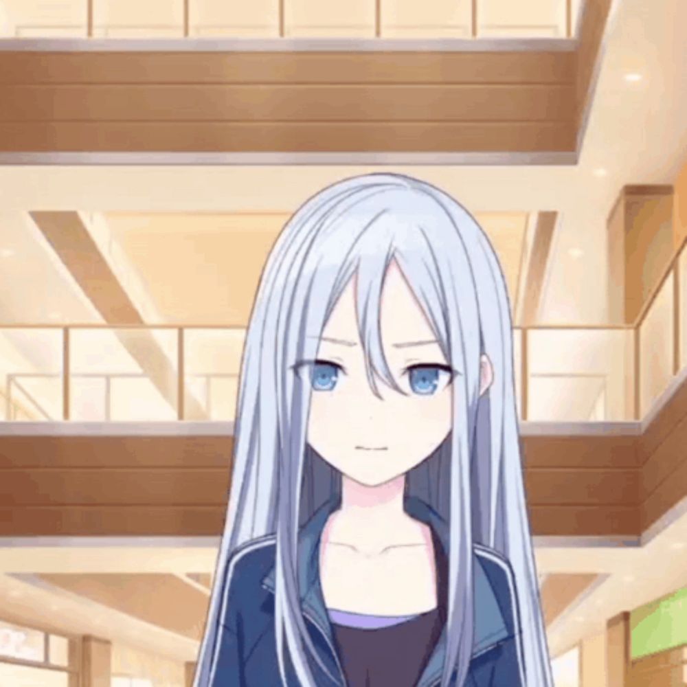 a girl with long white hair and blue eyes is standing in a hallway in a building .