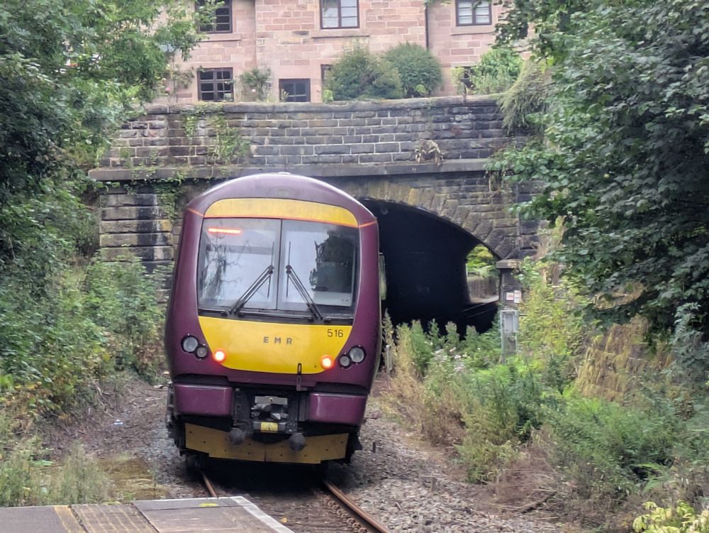A Class 170 train departing Whatstandwell station 