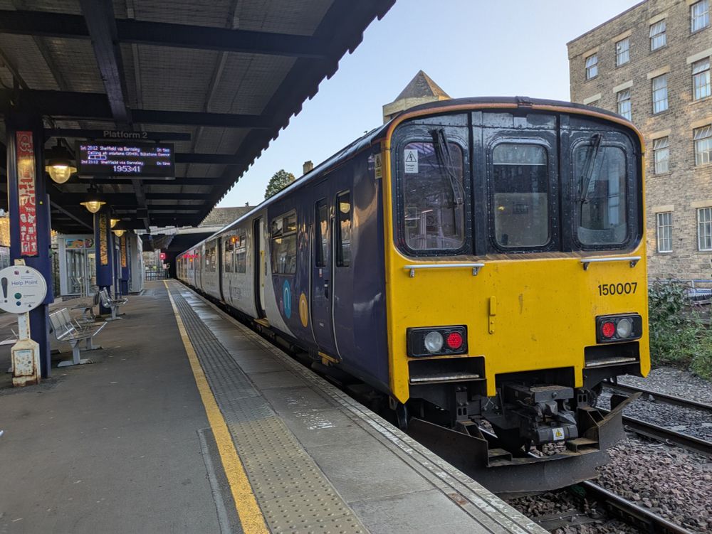 A Class 150 train at Huddersfield train station 