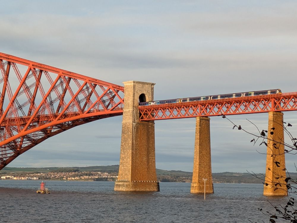 A train exiting a span of the Forth Bridge