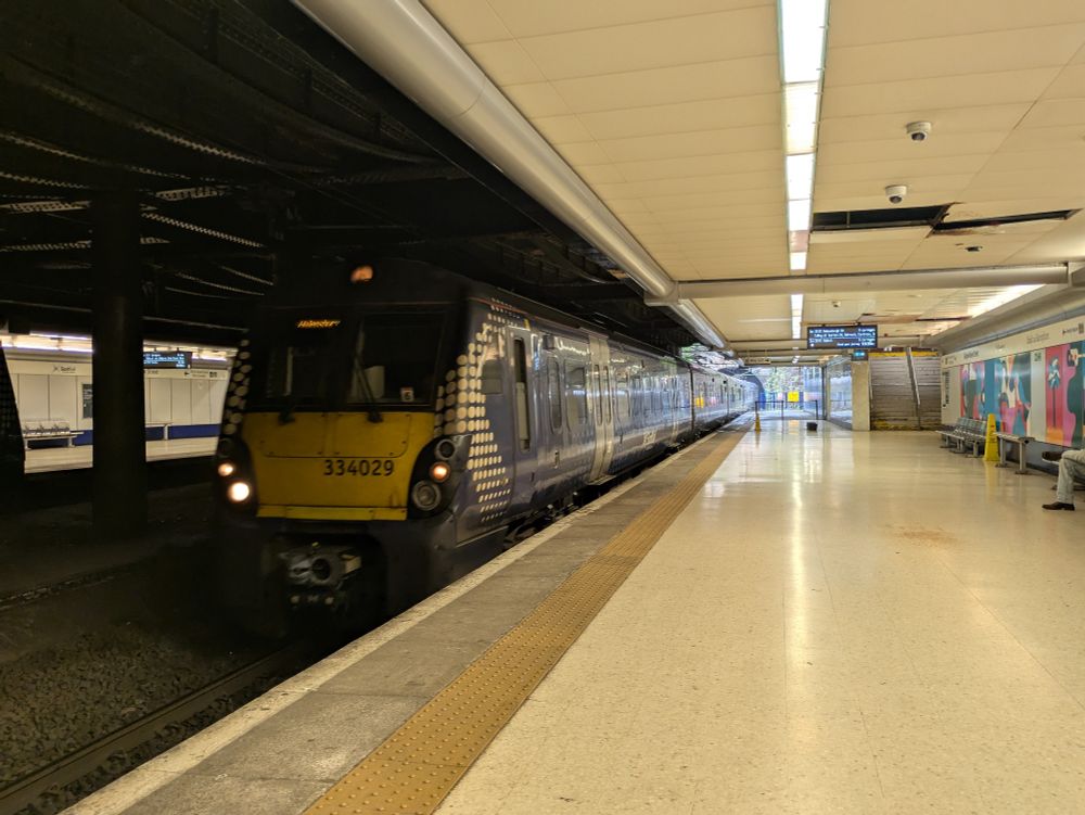 A Class 334 train at Glasgow Queen Street low level station