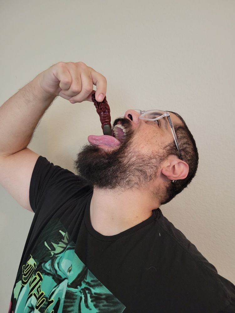 Eating a gummy finger like an anime character did.