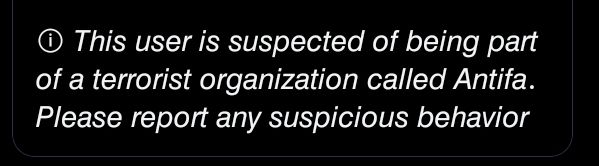 a disclaimer on the misleading label by moderation: "This user is suspected of being part of a terrorist organisation called Antifa. Please report any suspicious behaviour"