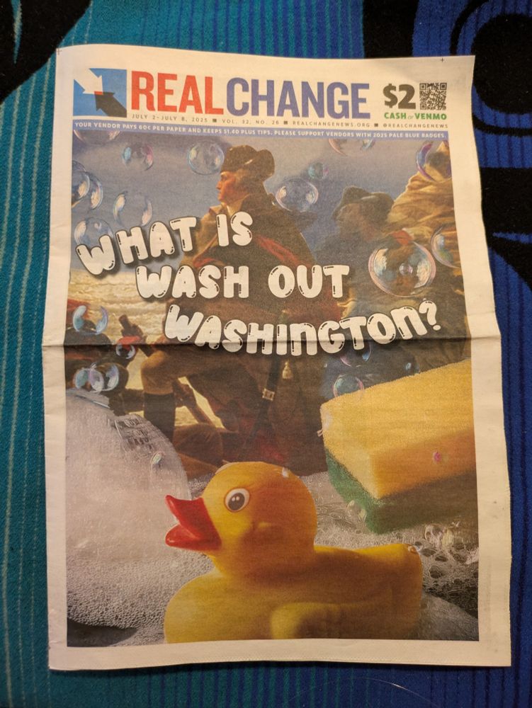 Cover of a newspaper that has george washington being washed away with bubbles and sponges and a rubber duck.