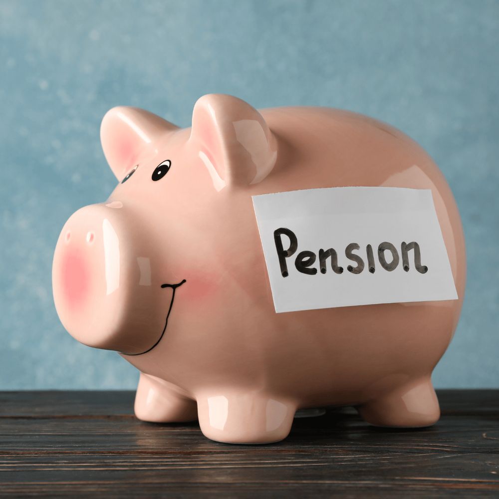 Piggy bank with the label, 'pension' stuck on the side.