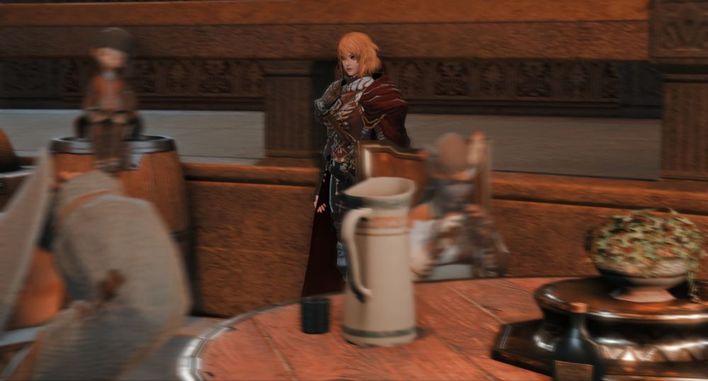 Melora at the Quicksand tavern in Ul'dah. The clients all appear blurred, except for her.
