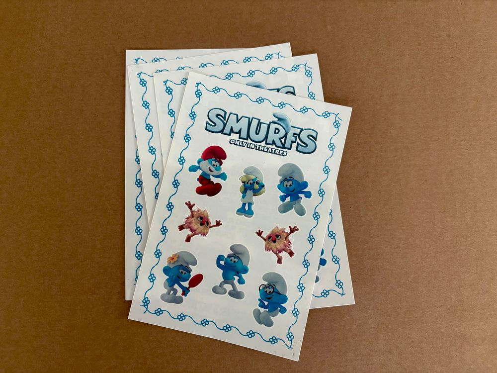 four (FOUR!) sheets of Smurfs temporary tattoos