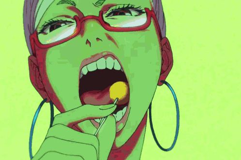 a woman with glasses and hoop earrings is eating a yellow lollipop