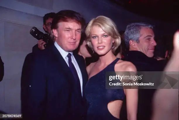 Donald Trump, Ingrid Seynhaeve And Jeffrey Epstein

American businessman and ex-president Donald Trump, Belgian model Ingrid Seynhaeve, and American businessman Jeffrey Epstein attend the Victoria's Secret “Angels” party on April 28, 1997 in New York City. (Sonia Moskowitz/Getty Images).