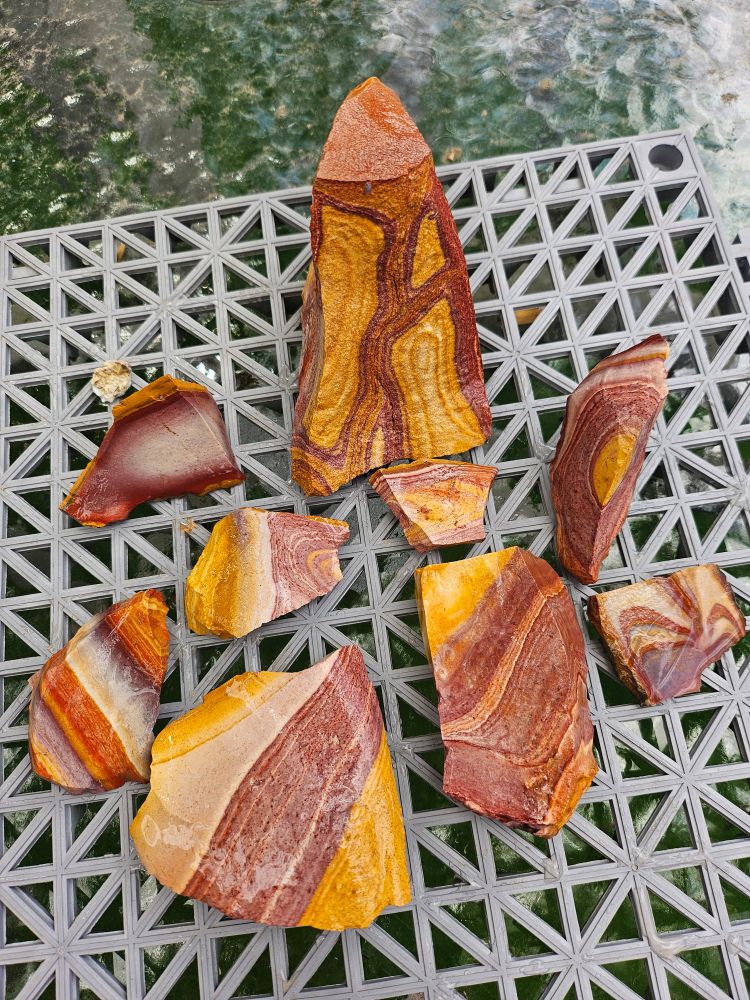A few pieces of wonder stone in red, yellow, orange, and purple.