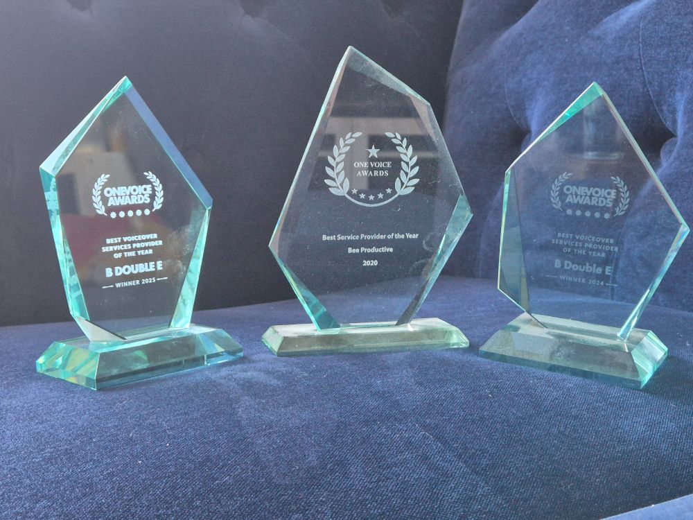 3 trophies for 'voiceover service provider of the year' in a row dated 202, 2024 and 2025.