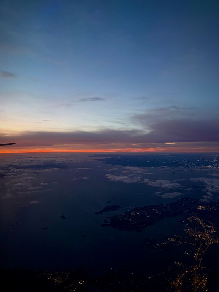 Flying over Boston at sunrise 